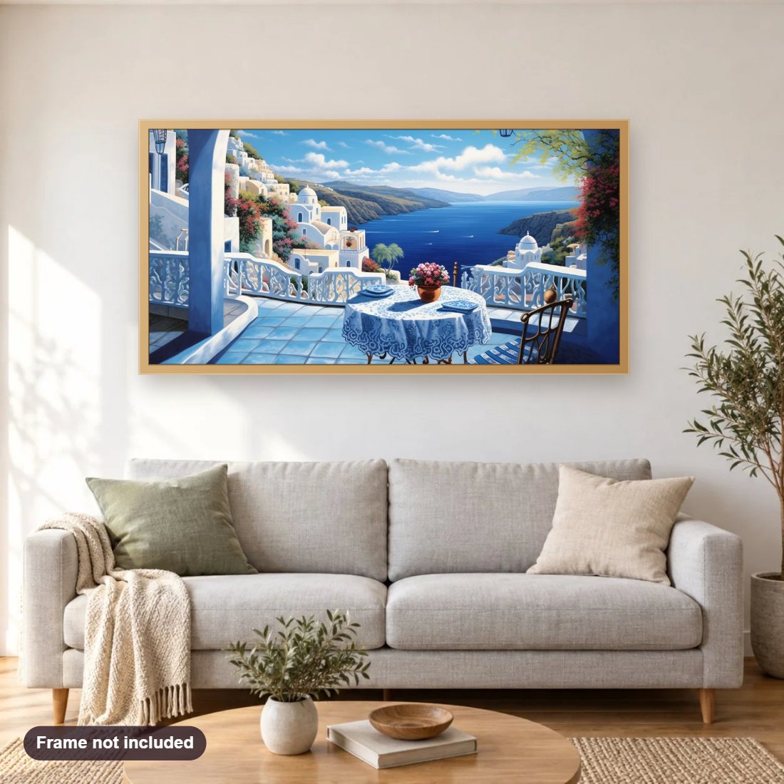 A Must Visiting Place in Greece diamond painting shown framed on a living room wall above a sofa