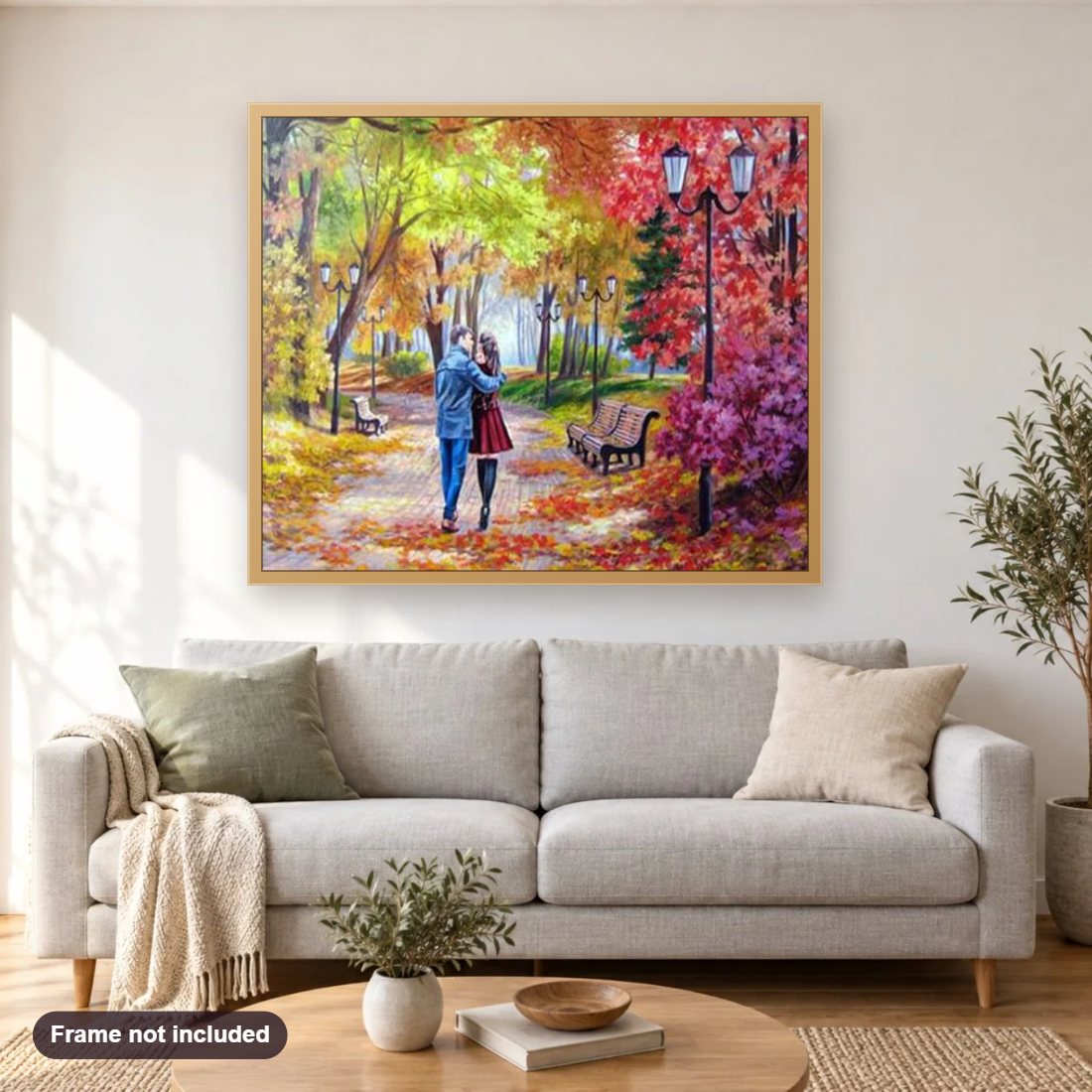 Couple Walking in Stunning Park diamond painting shown framed on a living room wall above a sofa