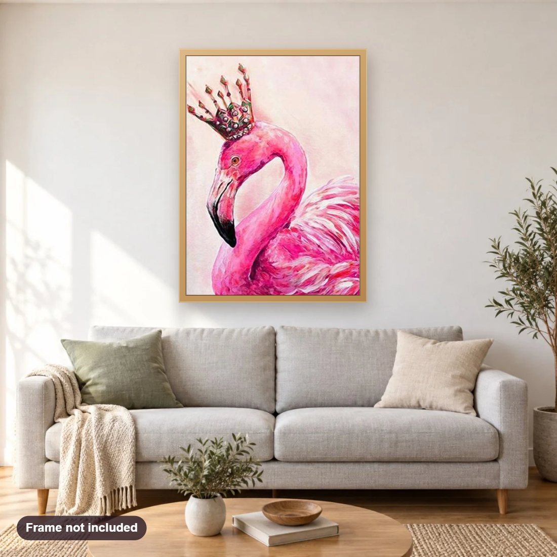 Crowned Flamingo diamond painting shown framed on a living room wall above a sofa