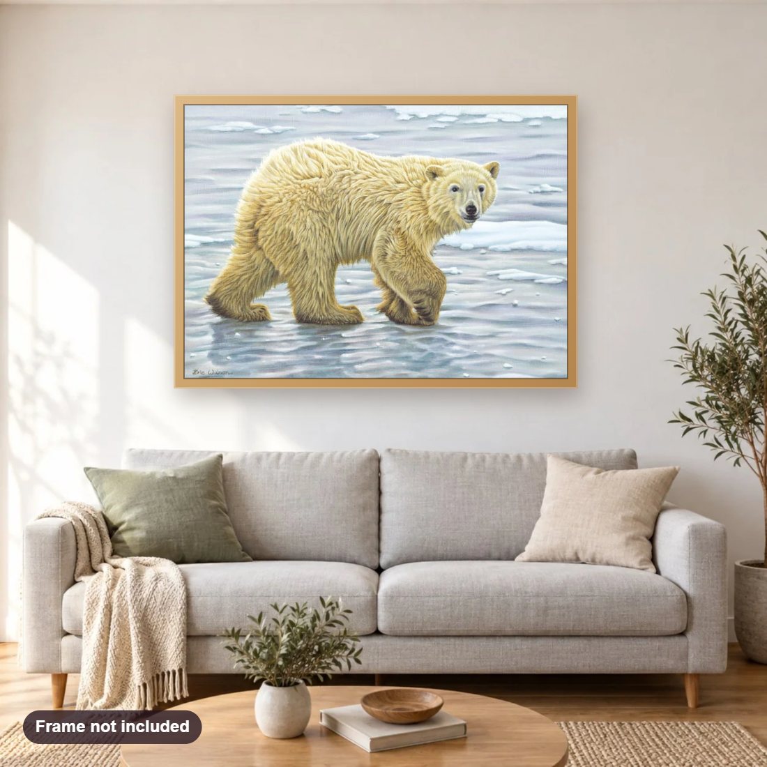 Curious Polar Bear Cub diamond painting shown framed on a living room wall above a sofa