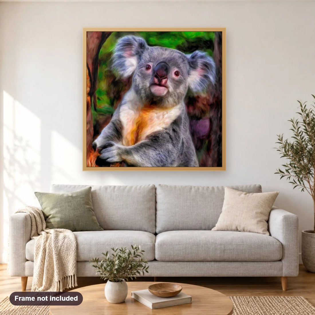 Cute Baby Koala diamond painting shown framed on a living room wall above a sofa