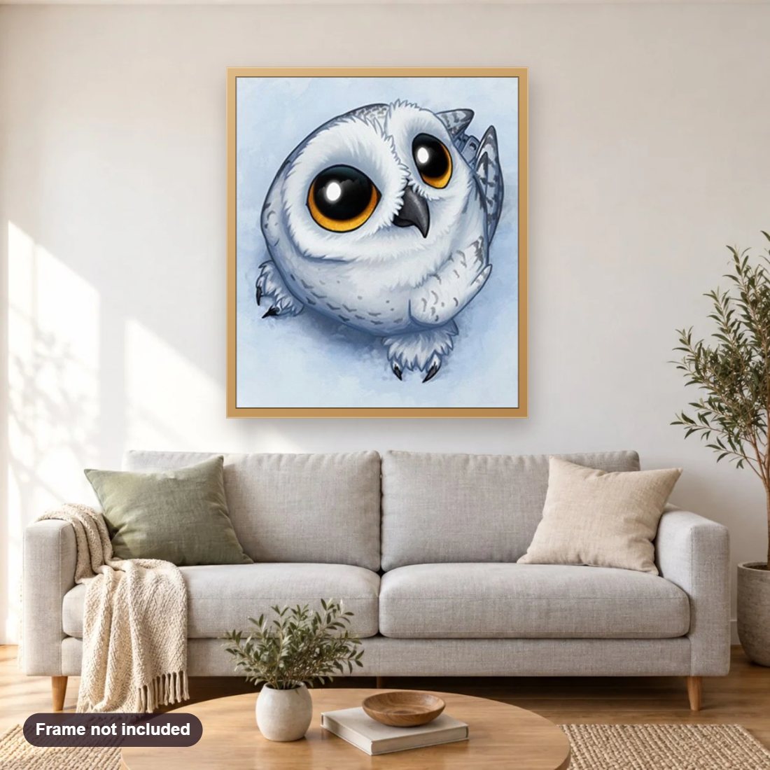 Cute Baby Owl diamond painting shown framed on a living room wall above a sofa