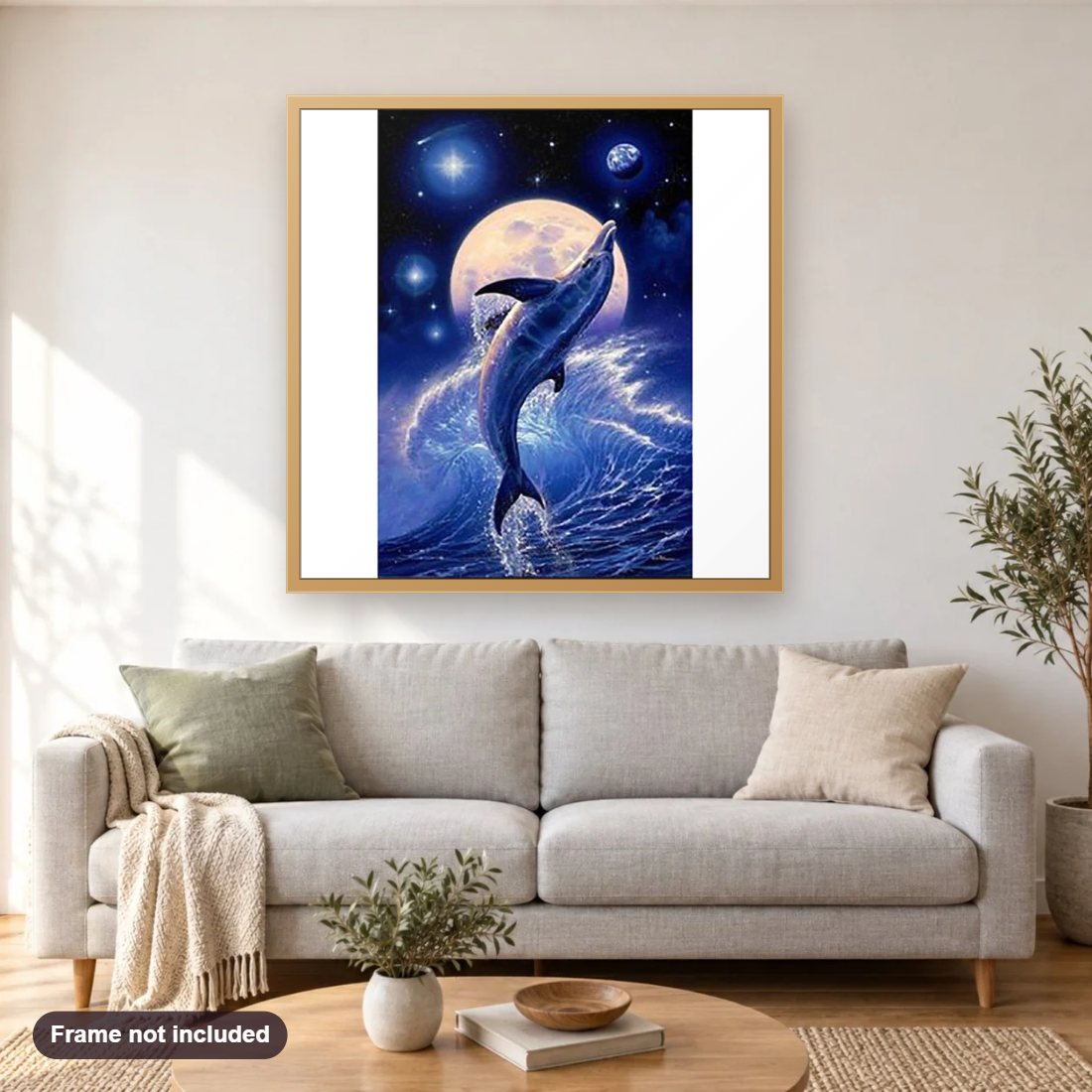 Cute Dolphin diamond painting shown framed on a living room wall above a sofa
