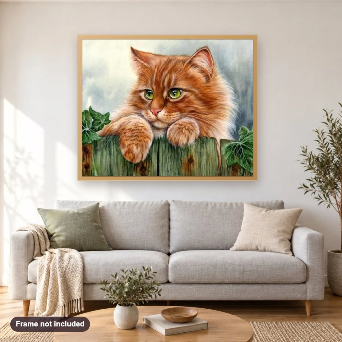Cute Ginger Cat with Green Eyes diamond painting shown framed on a living room wall above a sofa