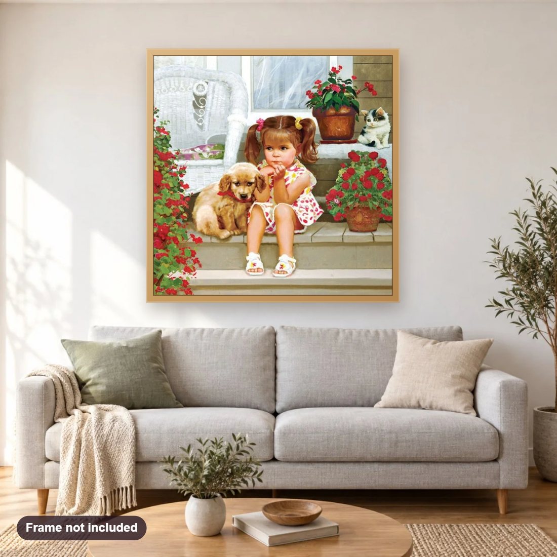 Cute Girl with her Puppy & Kitten diamond painting shown framed on a living room wall above a sofa