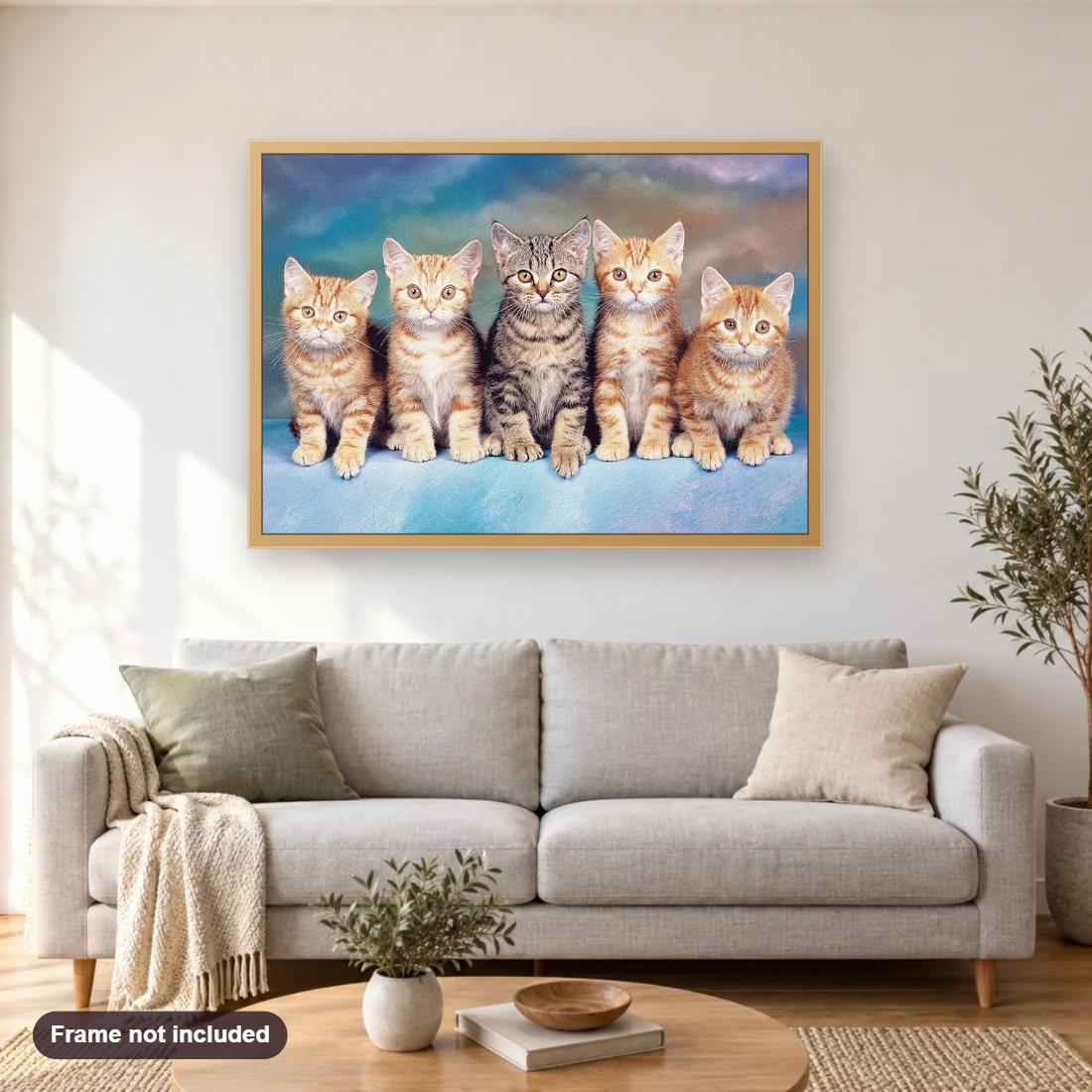 Cute Group of Cats diamond painting shown framed on a living room wall above a sofa