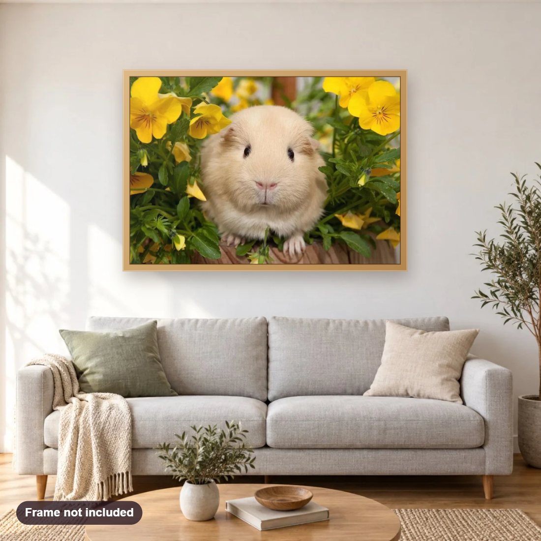 Cute Guinea pig & Yellow Flowers diamond painting shown framed on a living room wall above a sofa