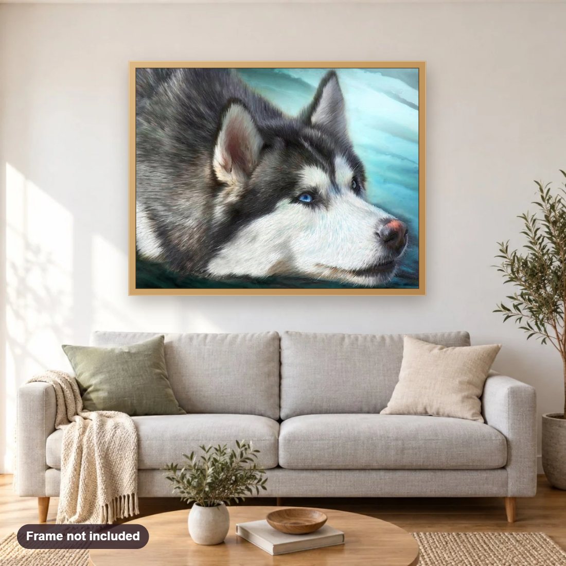 Cute Husky diamond painting shown framed on a living room wall above a sofa