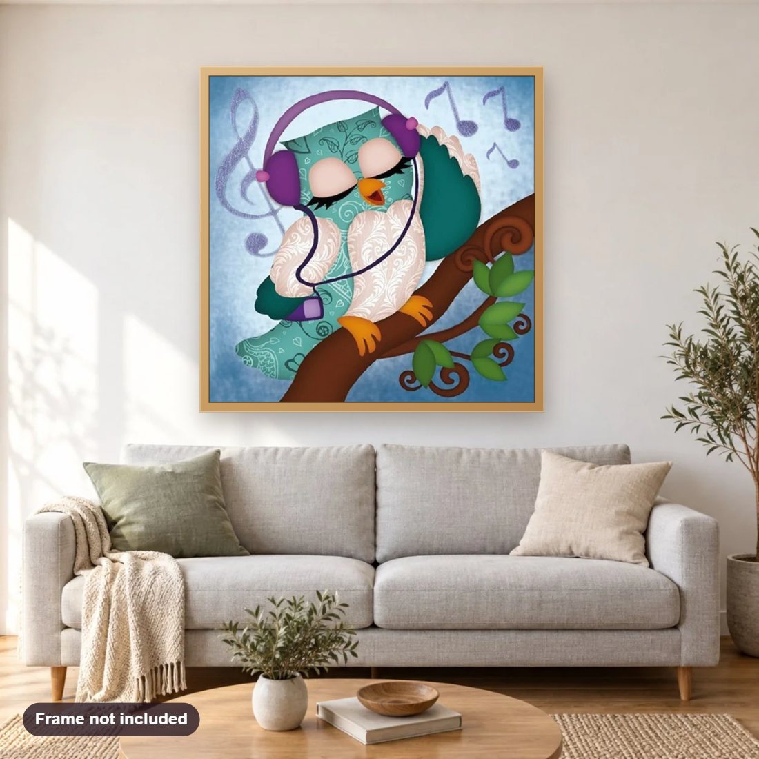 Cute Owl Listening Music diamond painting shown framed on a living room wall above a sofa