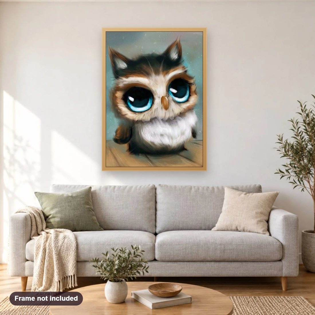 Cute Owl with Blue Eyes diamond painting shown framed on a living room wall above a sofa