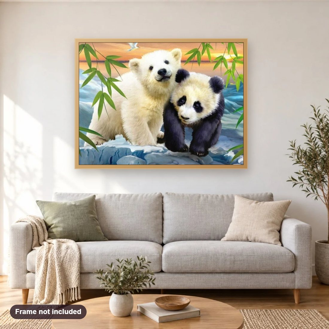 Cute Panda & Polar Bear diamond painting shown framed on a living room wall above a sofa