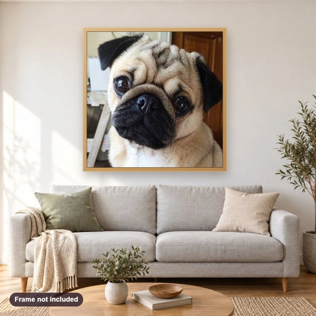 Cute Pug Dog diamond painting shown framed on a living room wall above a sofa