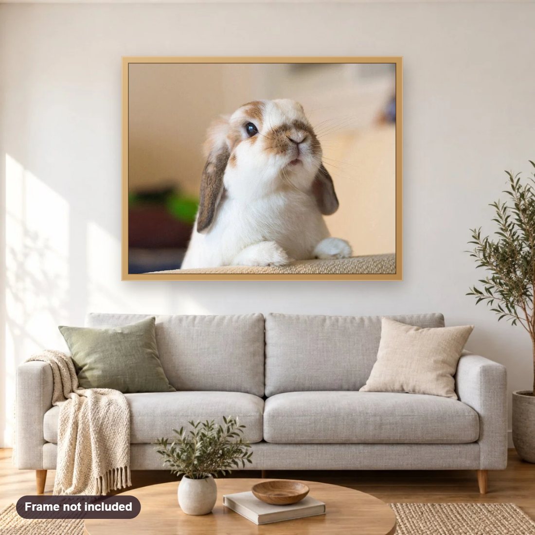 Cute Rabbit diamond painting shown framed on a living room wall above a sofa