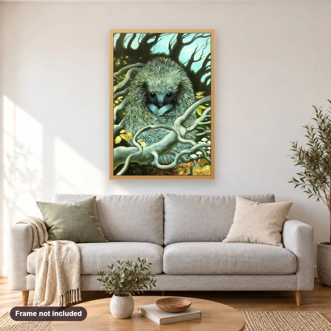 Cutest Hedgehog Baby diamond painting shown framed on a living room wall above a sofa