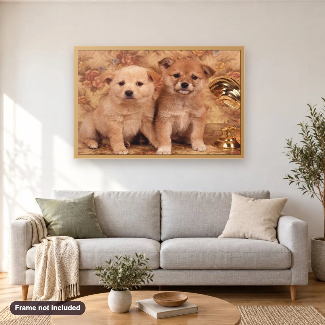Cutest Puppies diamond painting shown framed on a living room wall above a sofa