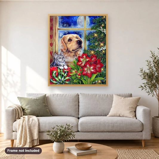 Dog, Cat & Christmas Tree diamond painting shown framed on a living room wall above a sofa