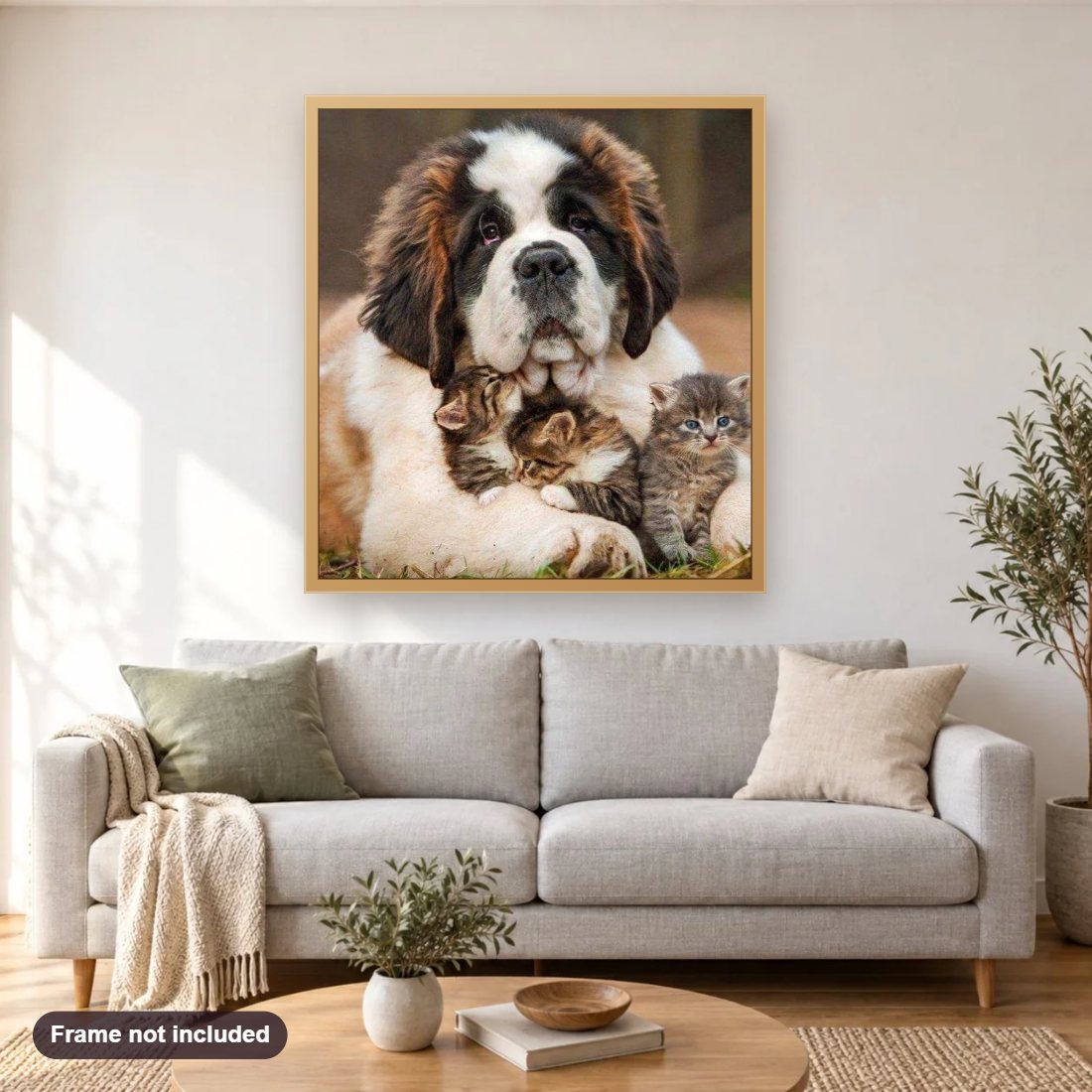 Dog with Three Kittens diamond painting shown framed on a living room wall above a sofa