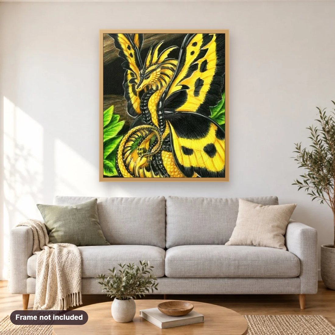 Dragon Butterfly diamond painting shown framed on a living room wall above a sofa