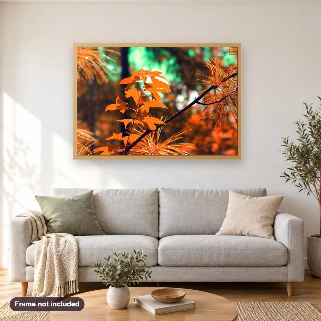 Dried Autumn Leaves diamond painting shown framed on a living room wall above a sofa