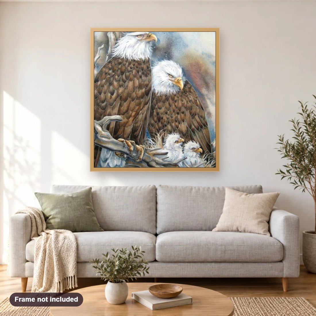 Eagle Family in the Nest diamond painting shown framed on a living room wall above a sofa