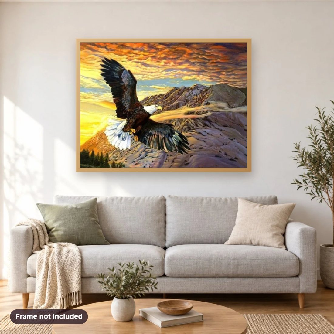 Eagle Flying by Mountains diamond painting shown framed on a living room wall above a sofa