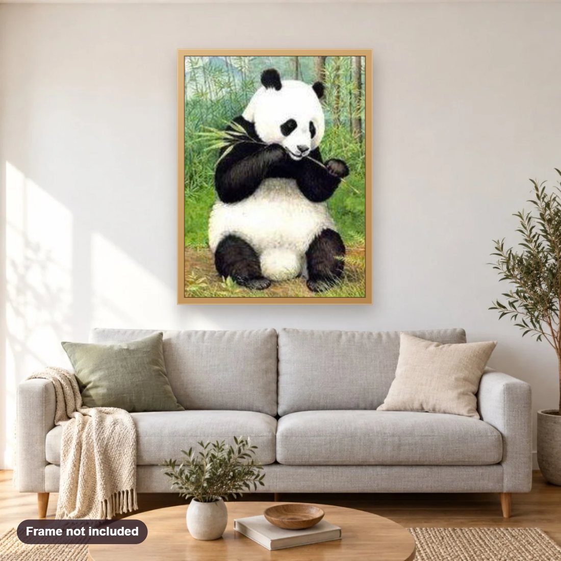 Eating Panda Diamond Painting Art diamond painting shown framed on a living room wall above a sofa