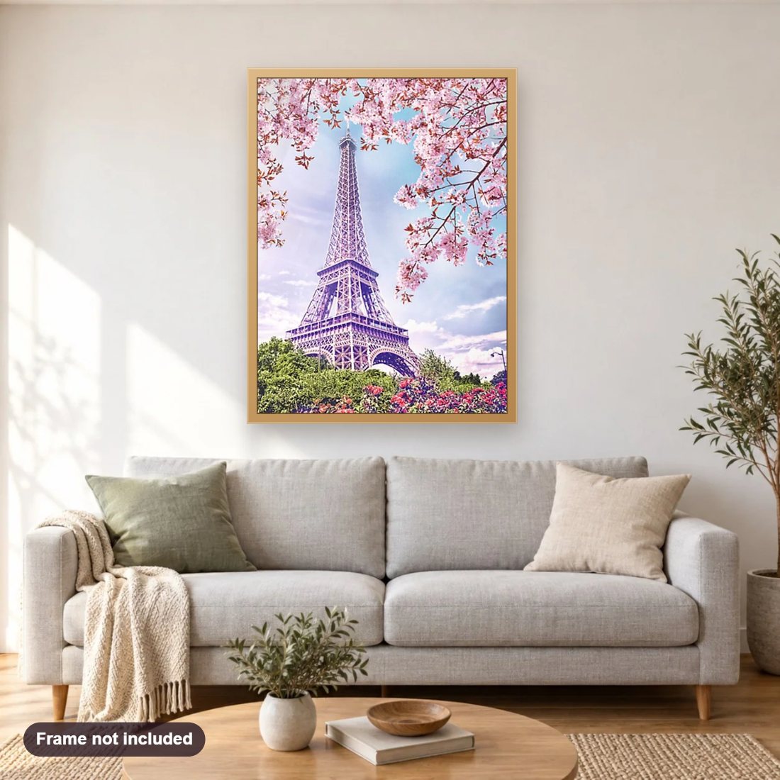 Eiffel Tower Landscape Beauty diamond painting shown framed on a living room wall above a sofa