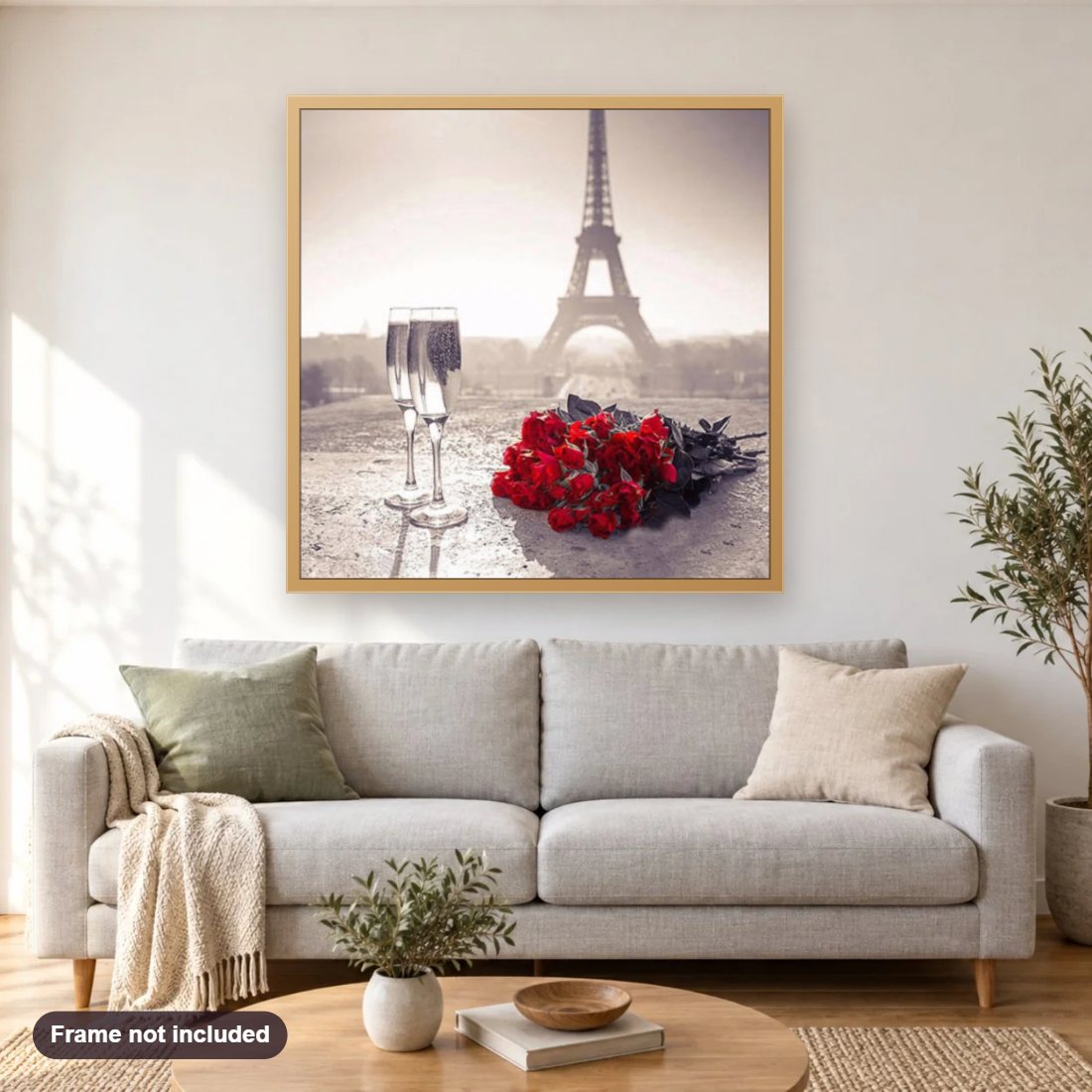 Eiffel Tower & Rose Bouquet diamond painting shown framed on a living room wall above a sofa
