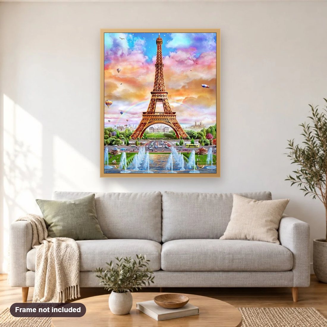 Eiffel Tower & Water Fountains diamond painting shown framed on a living room wall above a sofa