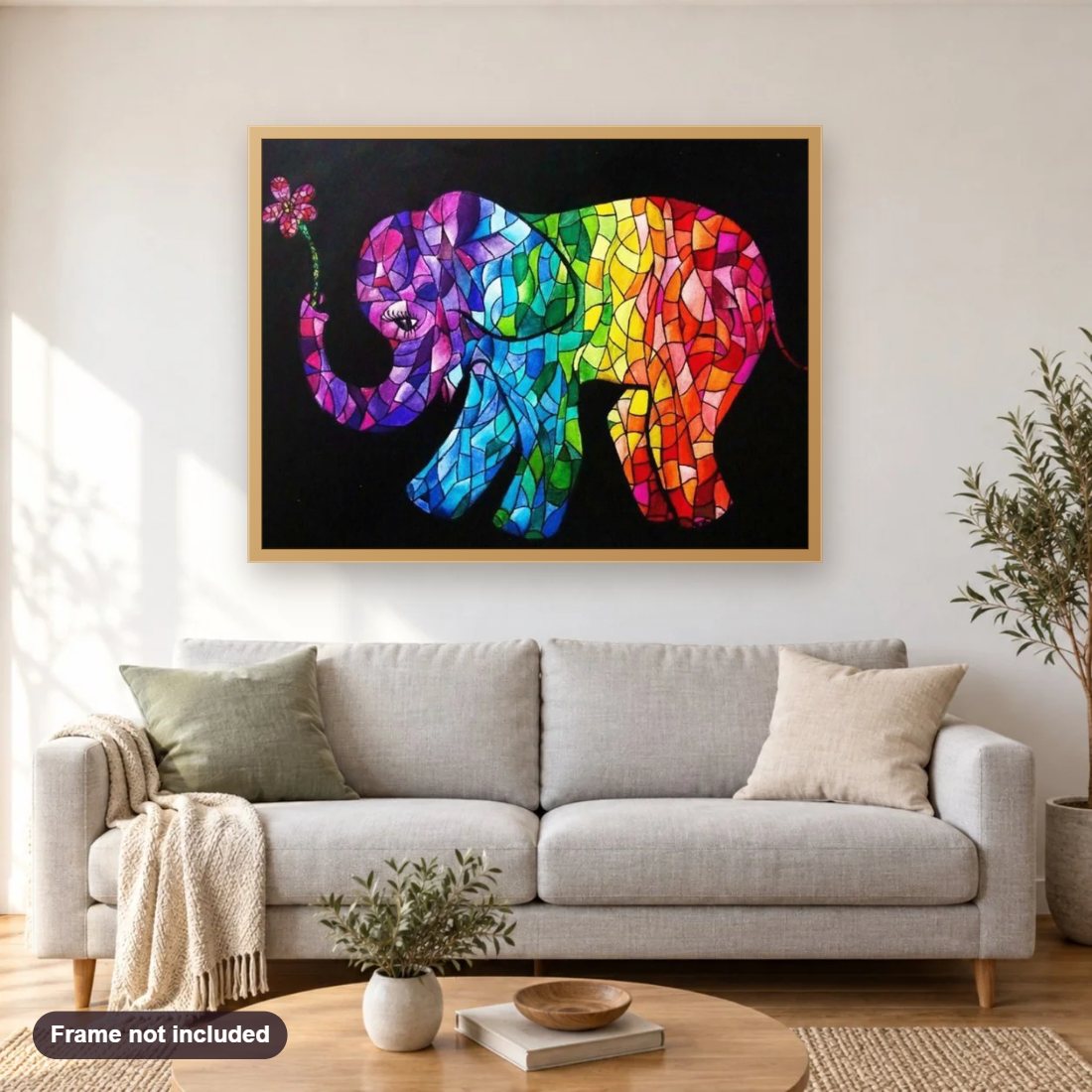 Elephant Art Stained Glass diamond painting shown framed on a living room wall above a sofa