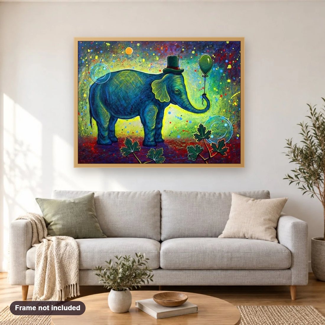 Elephant Celebrating Birthday diamond painting shown framed on a living room wall above a sofa