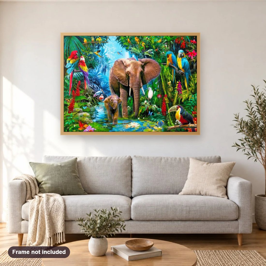 Elephants & Parrots diamond painting shown framed on a living room wall above a sofa