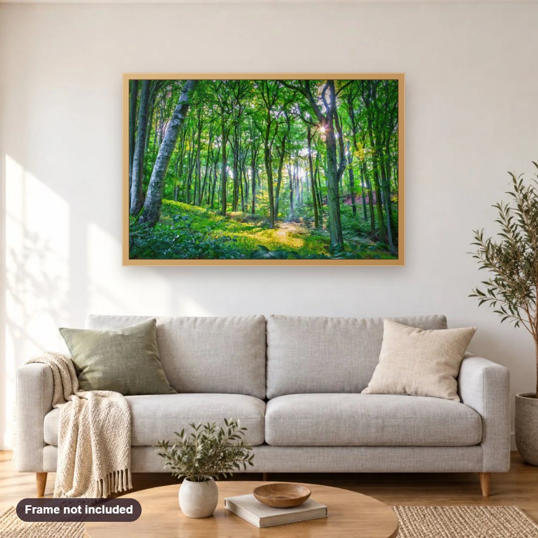 Emerald Forest diamond painting shown framed on a living room wall above a sofa