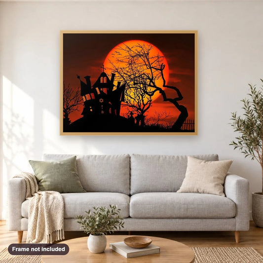 Enchanted Halloween House diamond painting shown framed on a living room wall above a sofa