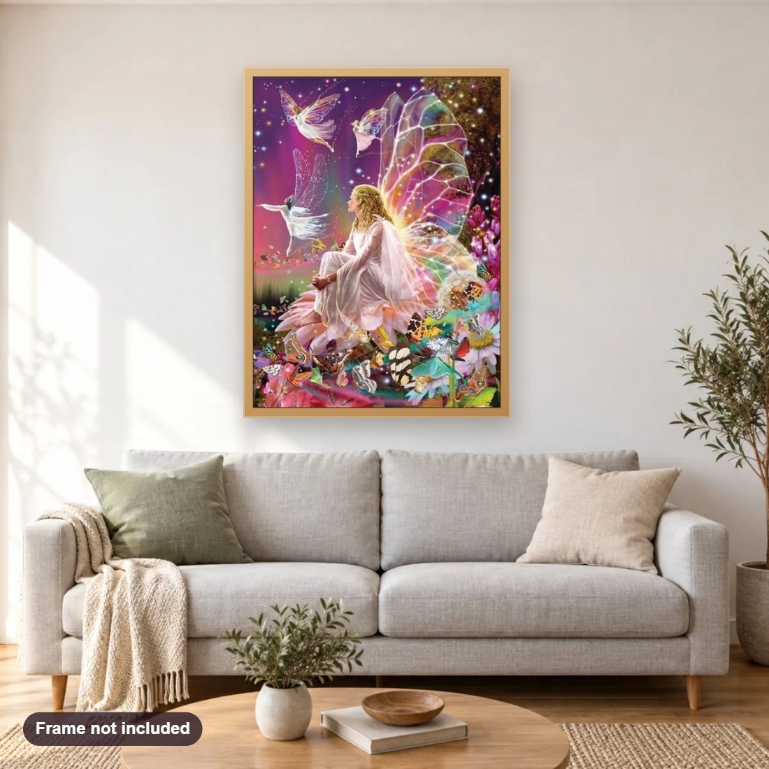 Fairies & Butterflies diamond painting shown framed on a living room wall above a sofa