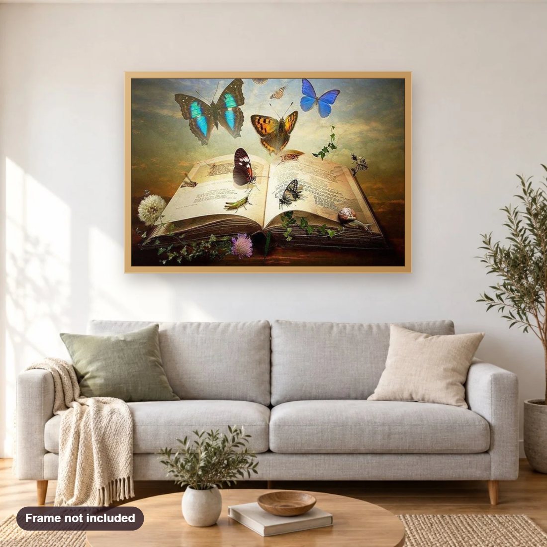 Fantasy Book diamond painting shown framed on a living room wall above a sofa