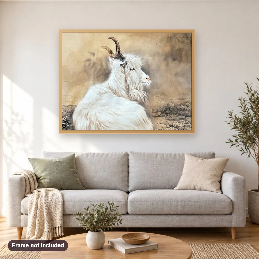 Feral Goat diamond painting shown framed on a living room wall above a sofa