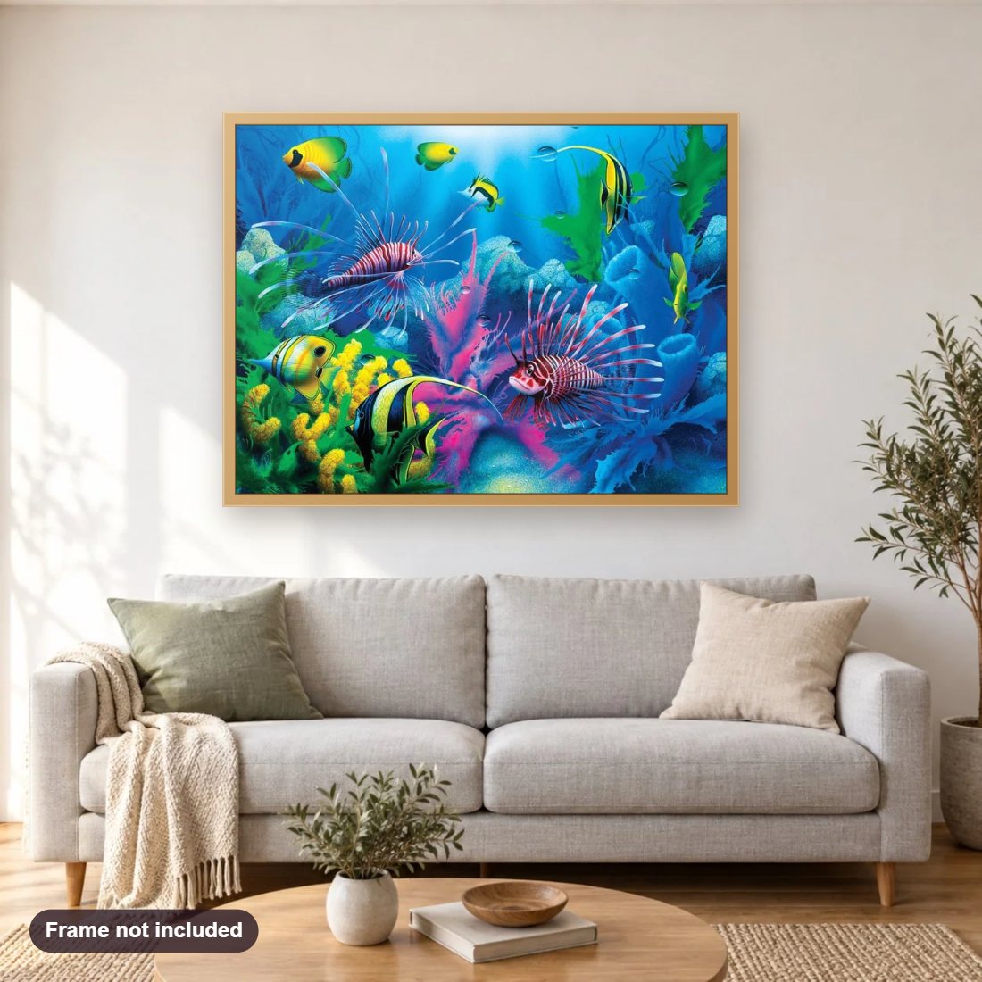 Fish Aquarium diamond painting shown framed on a living room wall above a sofa