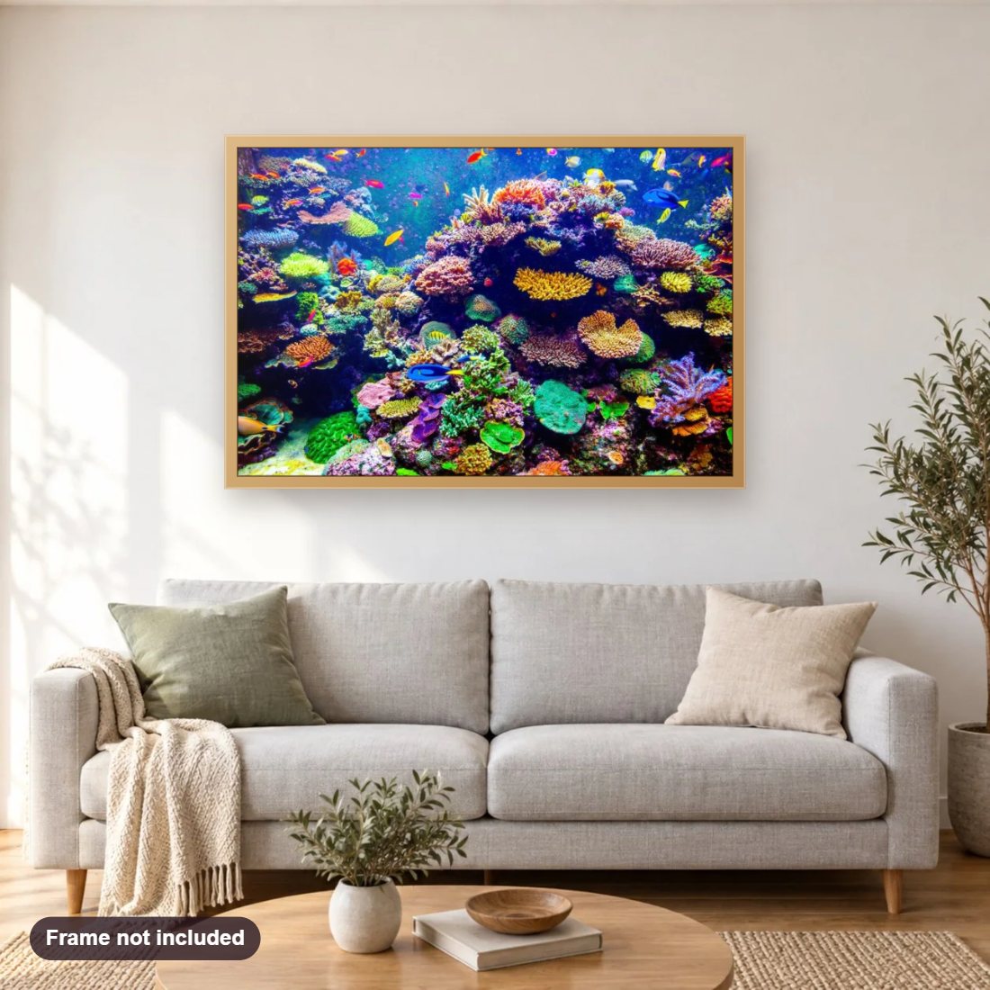 Fish & Coral Reef diamond painting shown framed on a living room wall above a sofa