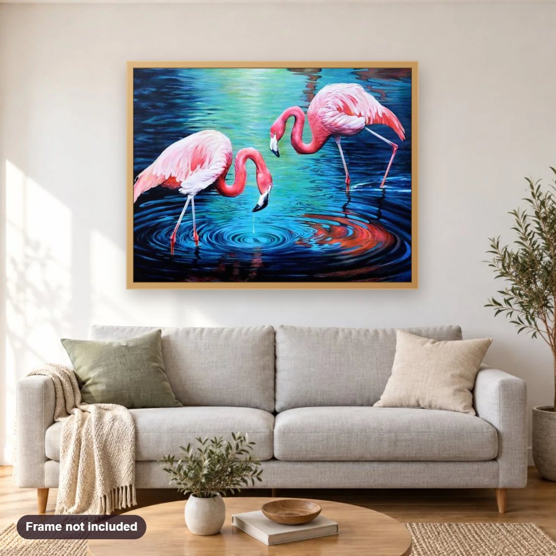 Flamingos Pair in Water diamond painting shown framed on a living room wall above a sofa