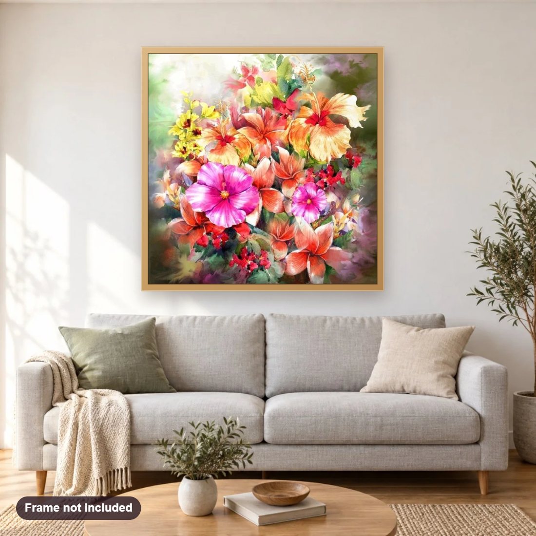 Flowers diamond painting shown framed on a living room wall above a sofa