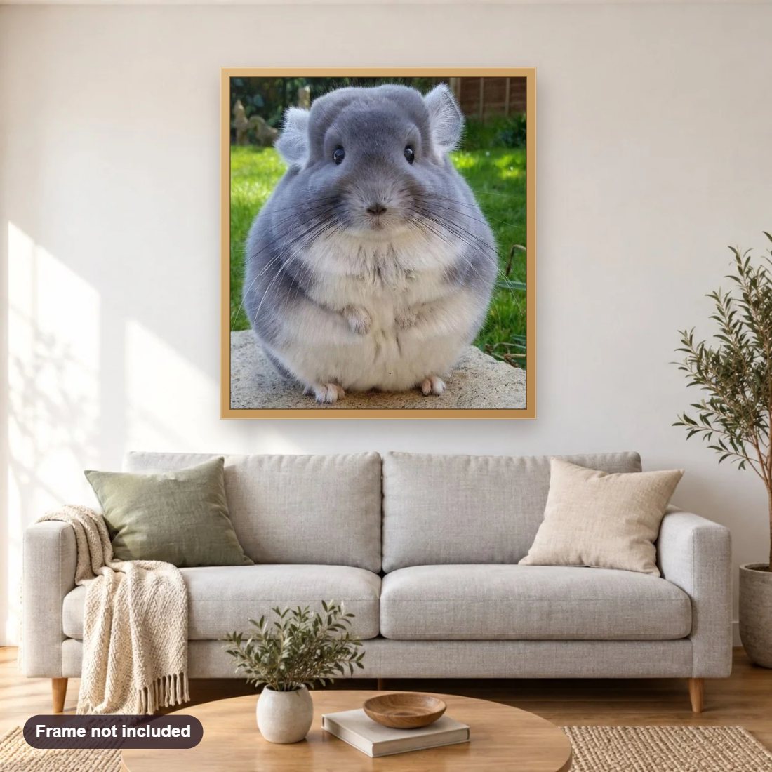 Fluffy Chinchilla diamond painting shown framed on a living room wall above a sofa