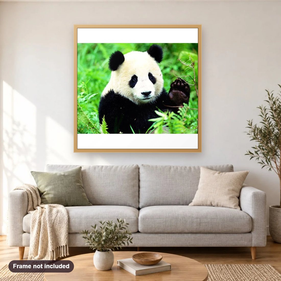 Forest Panda diamond painting shown framed on a living room wall above a sofa