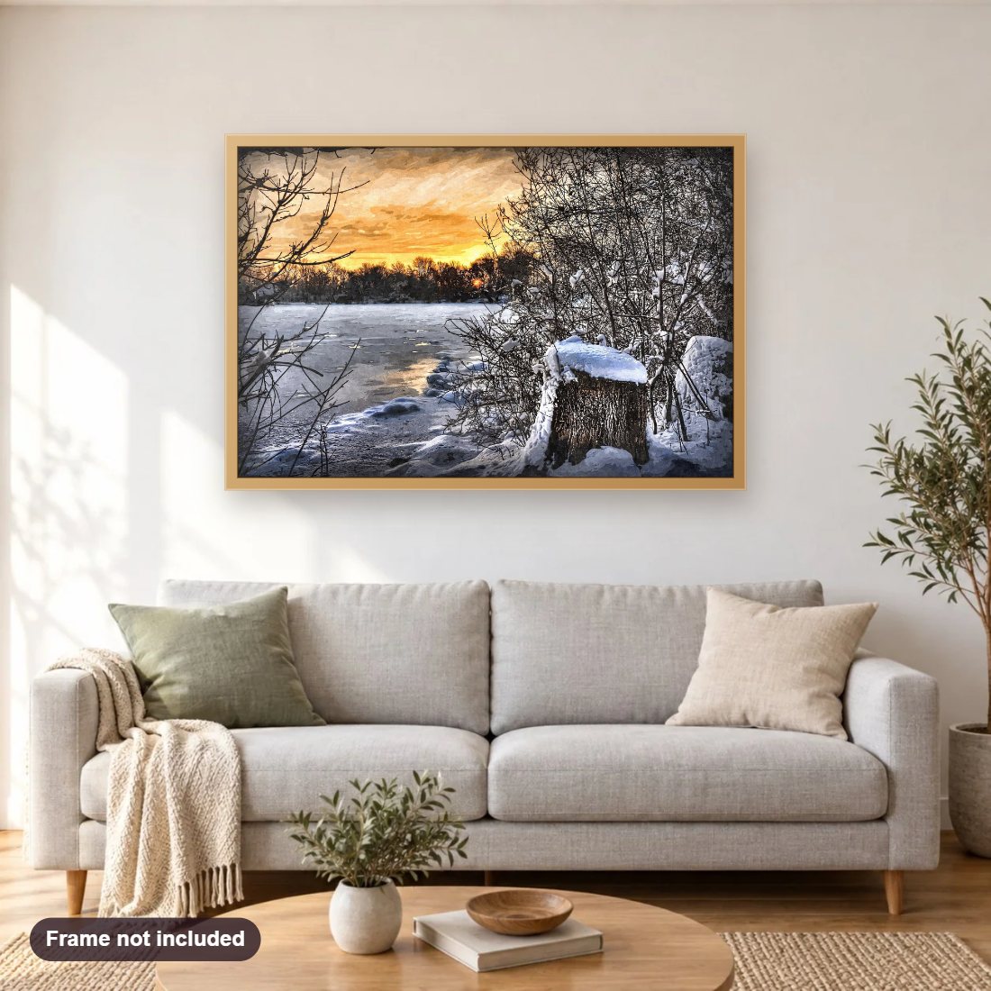Frozen Lake At Sunset diamond painting shown framed on a living room wall above a sofa