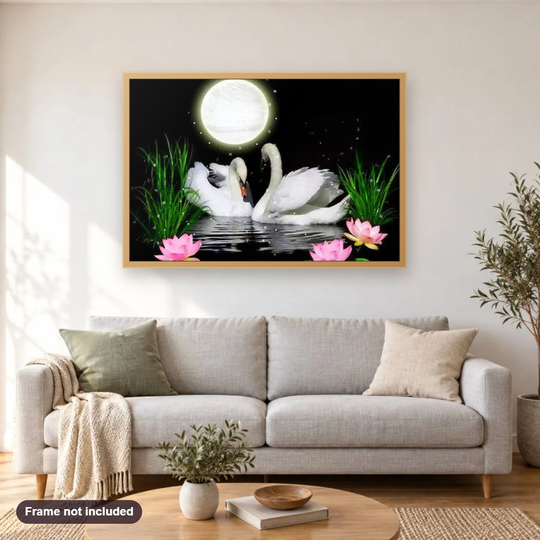 Full Moon & Swans Pair diamond painting shown framed on a living room wall above a sofa
