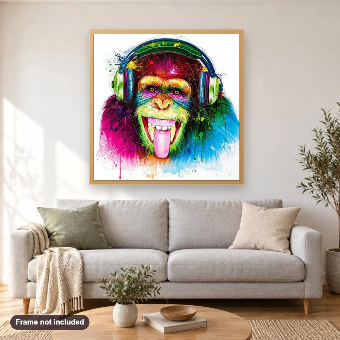 Funky Face Monkey diamond painting shown framed on a living room wall above a sofa