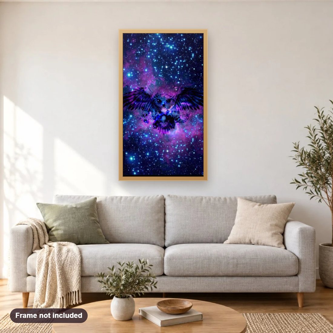 Galaxy & Owl diamond painting shown framed on a living room wall above a sofa
