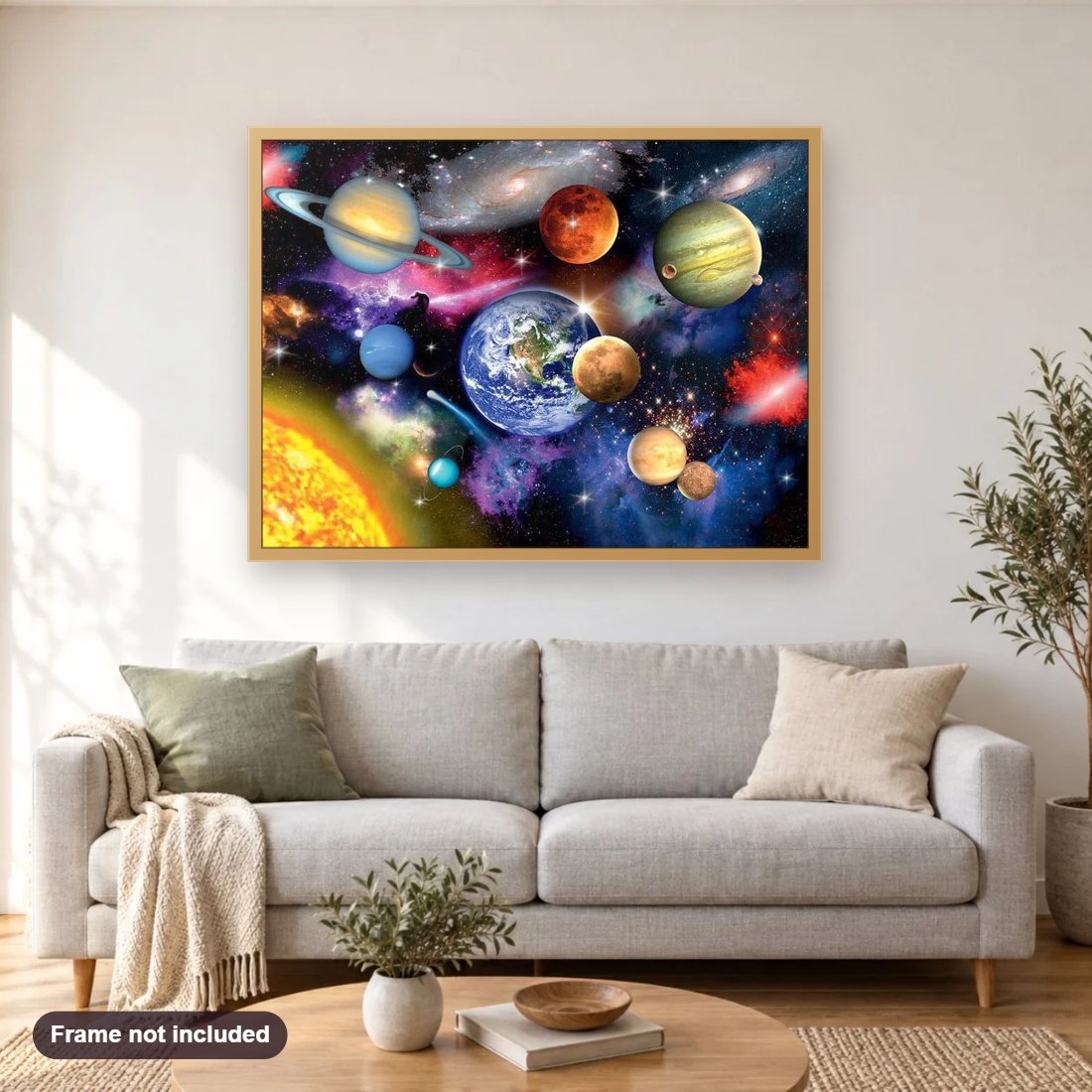 Galaxy & Planets diamond painting shown framed on a living room wall above a sofa