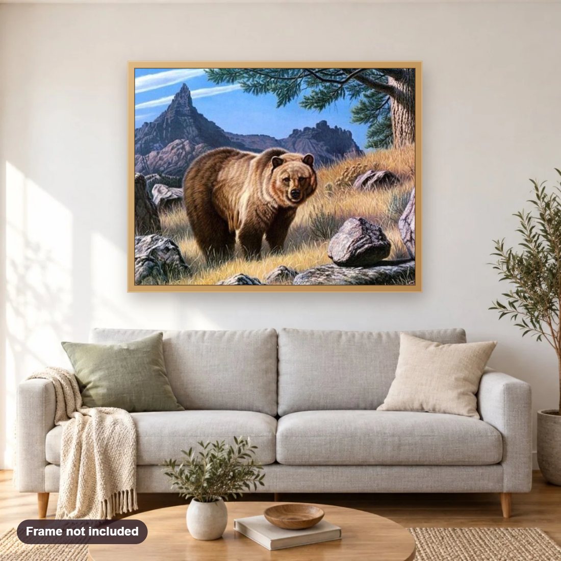 Gazing Bear diamond painting shown framed on a living room wall above a sofa