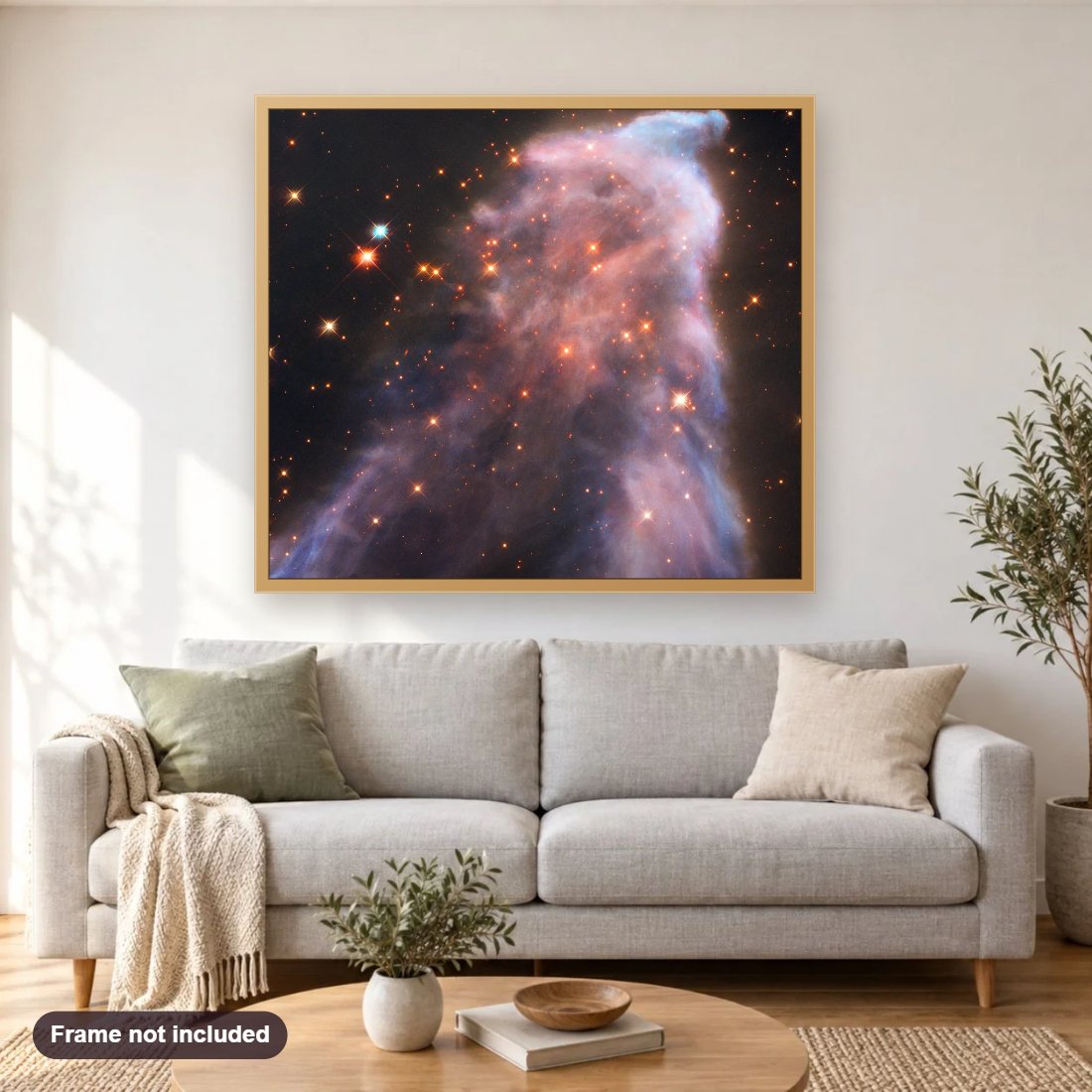 Ghost of Cassiopeia diamond painting shown framed on a living room wall above a sofa
